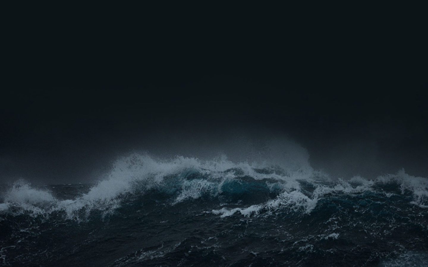 large sea waves at night time
